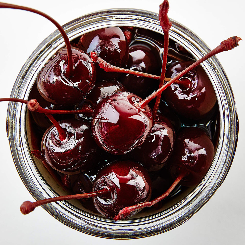 Close-up of Jack Rudy cherry texture and syrup, demonstrating rich fruit quality