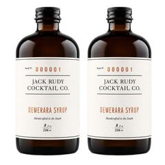 Jack Rudy bottle front view showing amber syrup and premium branding benefit