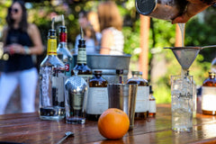 Jack Rudy Extra Bitter Tonic pouring detail showing richer quinine and drier gin pairing benefit