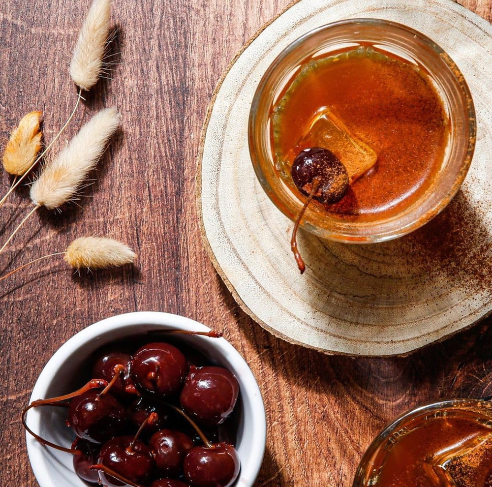 Jack Rudy syrup drizzled over coffee illustrating enhanced sweetness benefit