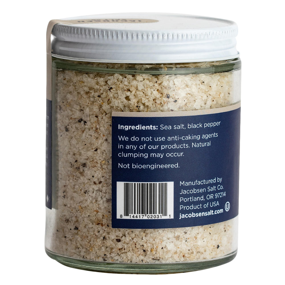 Jacobsen Salt Co. close-up of coarse crystals and Tellicherry pepper for texture