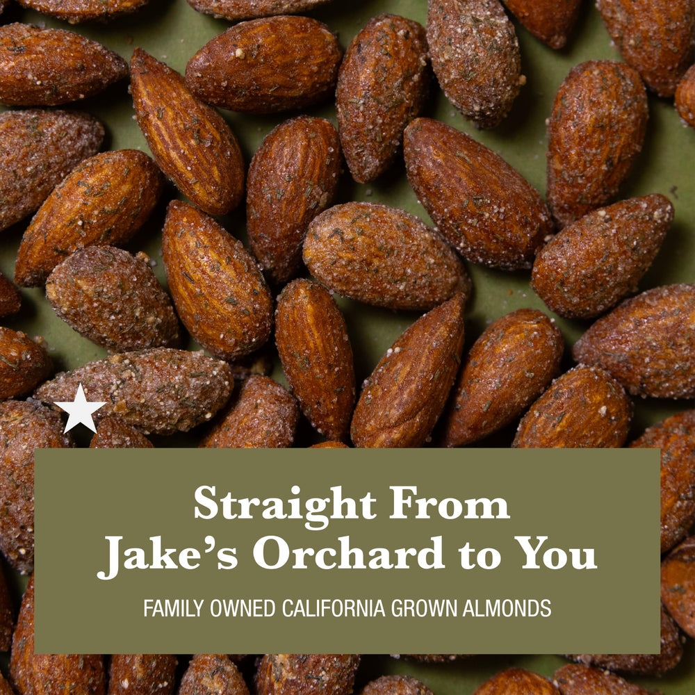 Jake's Nut Roasters opened 7 oz can top view showing packed almonds and freshness preserved