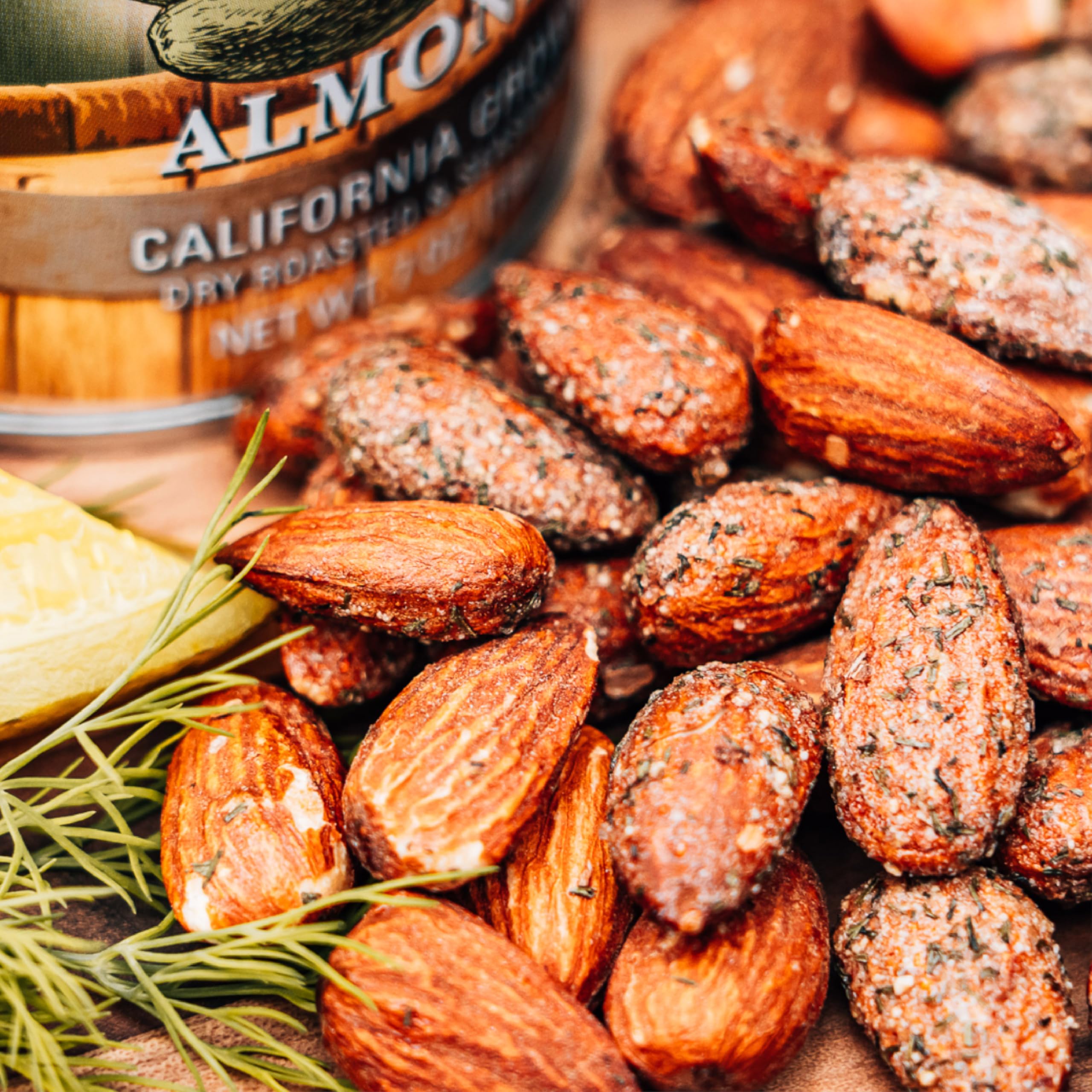 Jake's Nut Roasters can beside a hand for scale showing portion size and grab‑and‑go convenience