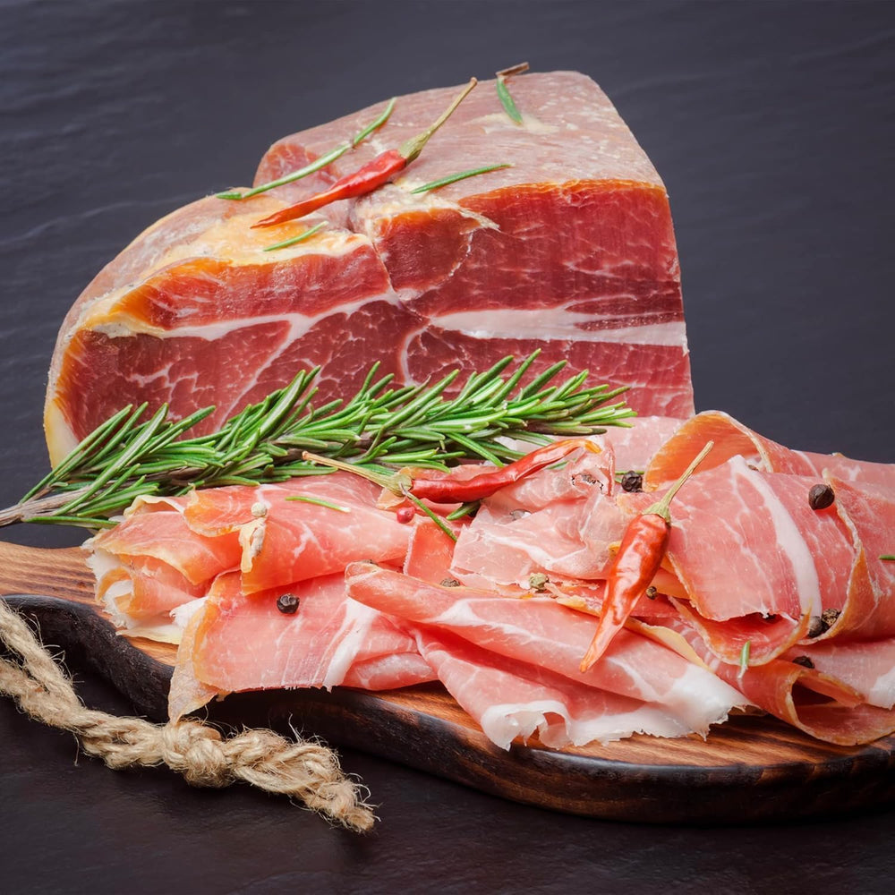 Jamonprive ham served on a charcuterie board in a kitchen setting for entertaining