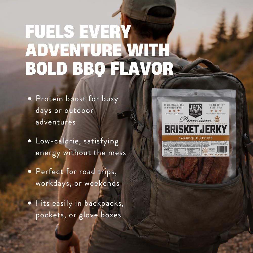 J&K Beef Brisket Jerky held in hand to show size and satisfying meat-forward portion