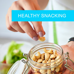 Jaybee's jar open with whole cashews visible, convenient ready-to-eat benefit