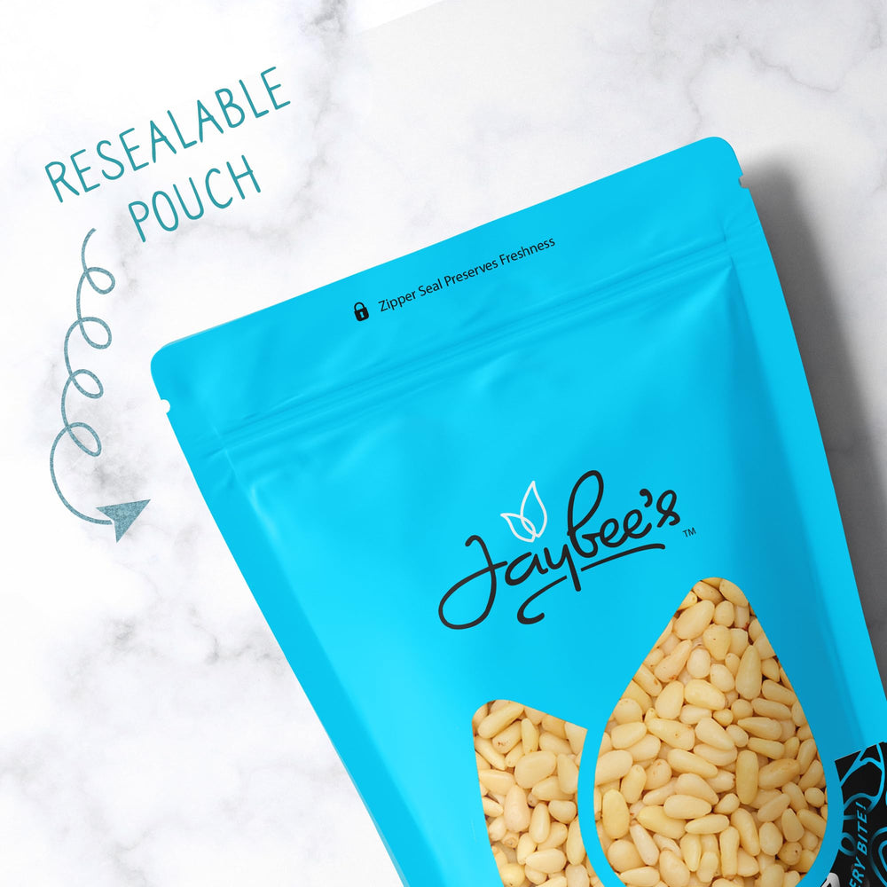 Jaybee's pine nuts used while preparing pesto to show culinary versatility