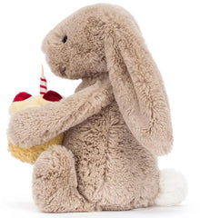 Jellycat Bashful Beige Bunny close-up of textured birthday cake and strawberry detail — tactile charm