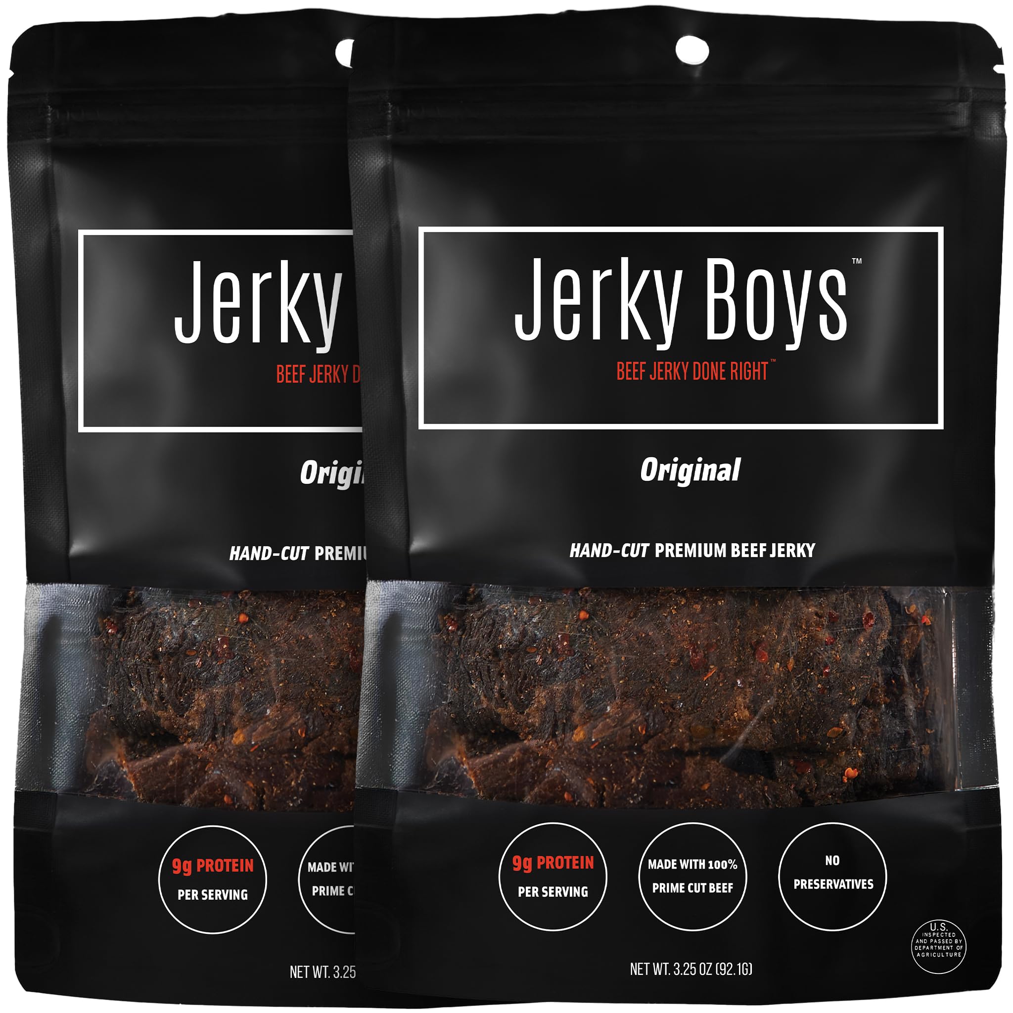 Jerky Boys strips on wooden board presenting serving suggestion and texture