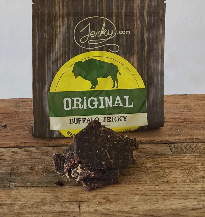 Jerky.com buffalo jerky close-up texture highlighting lean whole-muscle and rich seasoning
