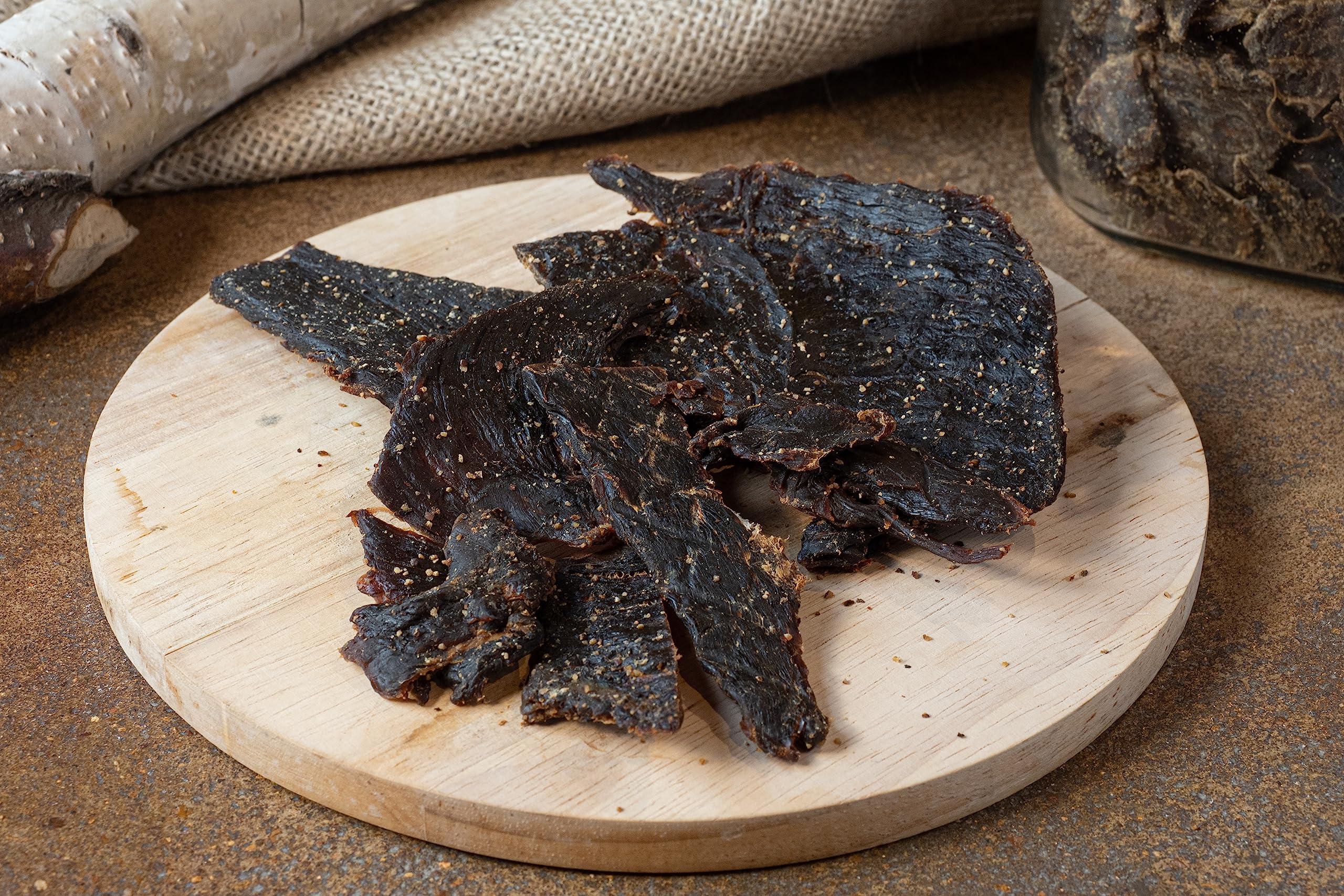 Jerky.com venison close-up of meat texture highlighting lean whole-muscle and natural chew