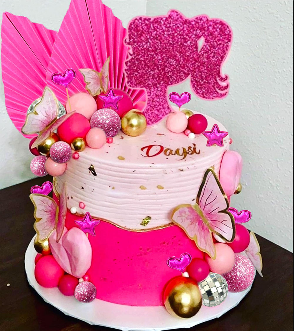 JeVenis topper on styled cake in party setting showcasing cohesive color coordination
