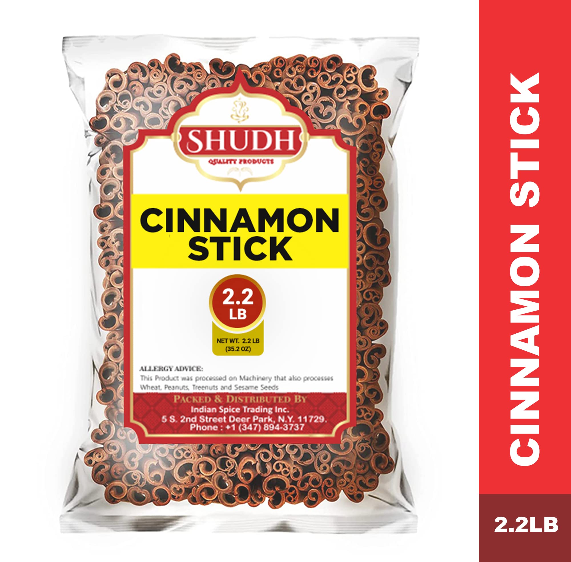 jimidar cinnamon stick next to hand for quick size comparison