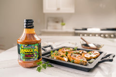 Johnny's dressing close-up texture showing glossy glaze and visible spice flecks