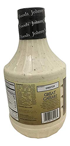 Johnny's Great Caesar poured over romaine salad, Johnny's adds classic Caesar flavor