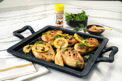 Johnny's seasoning sprinkled on grilled chicken illustrating enhanced savory crust and aroma