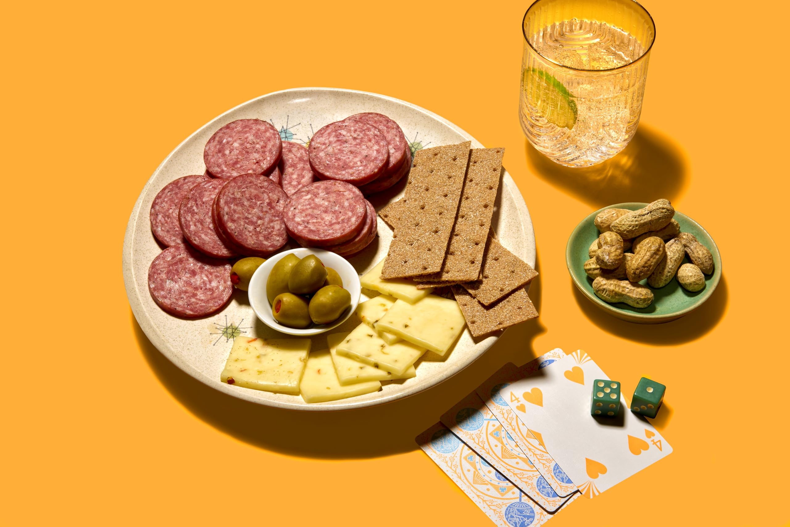 Johnsonville sausage beside measuring tools to show 1/20 oz portion and serving size