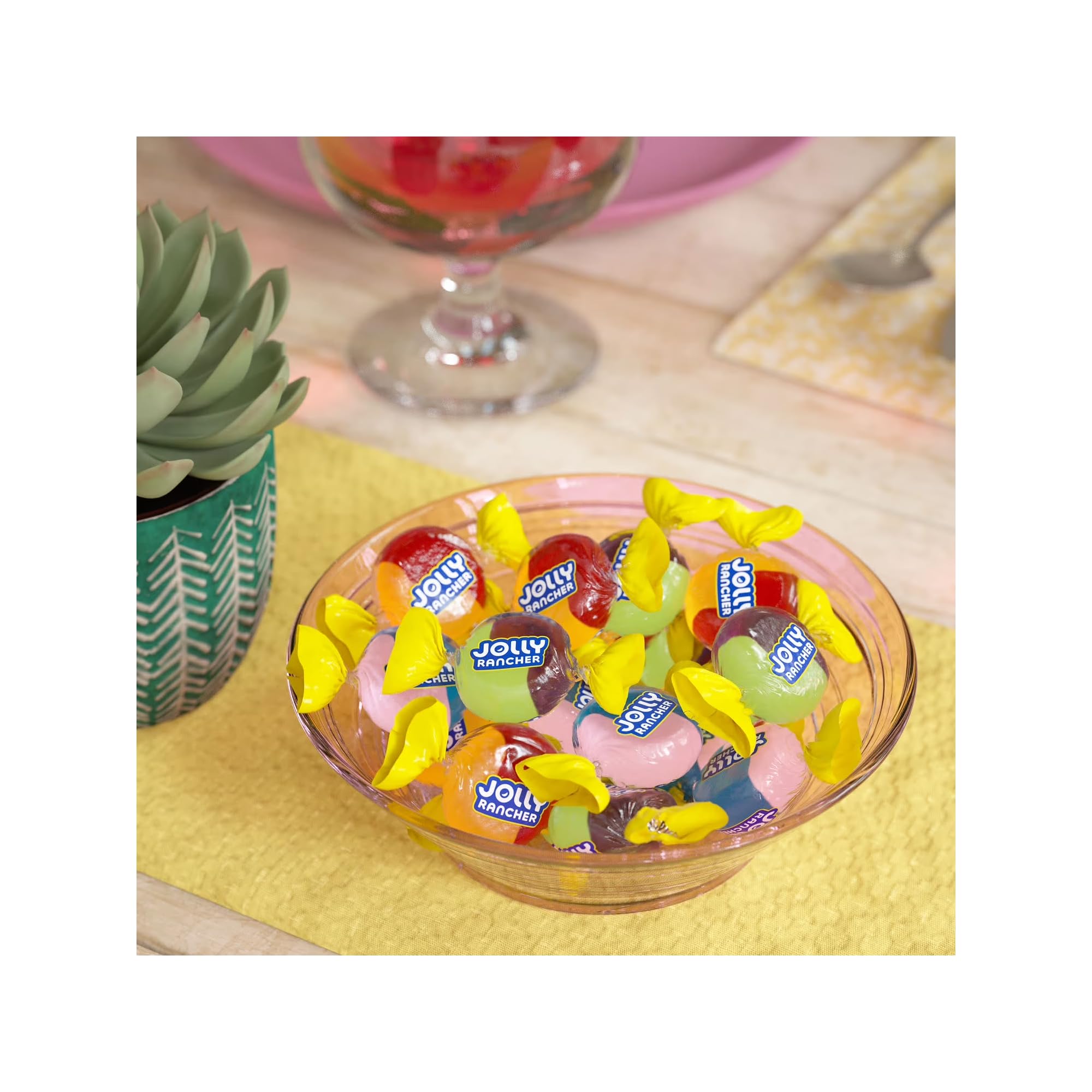 Jolly Rancher candies in hand to show single-serve size and quick snack convenience
