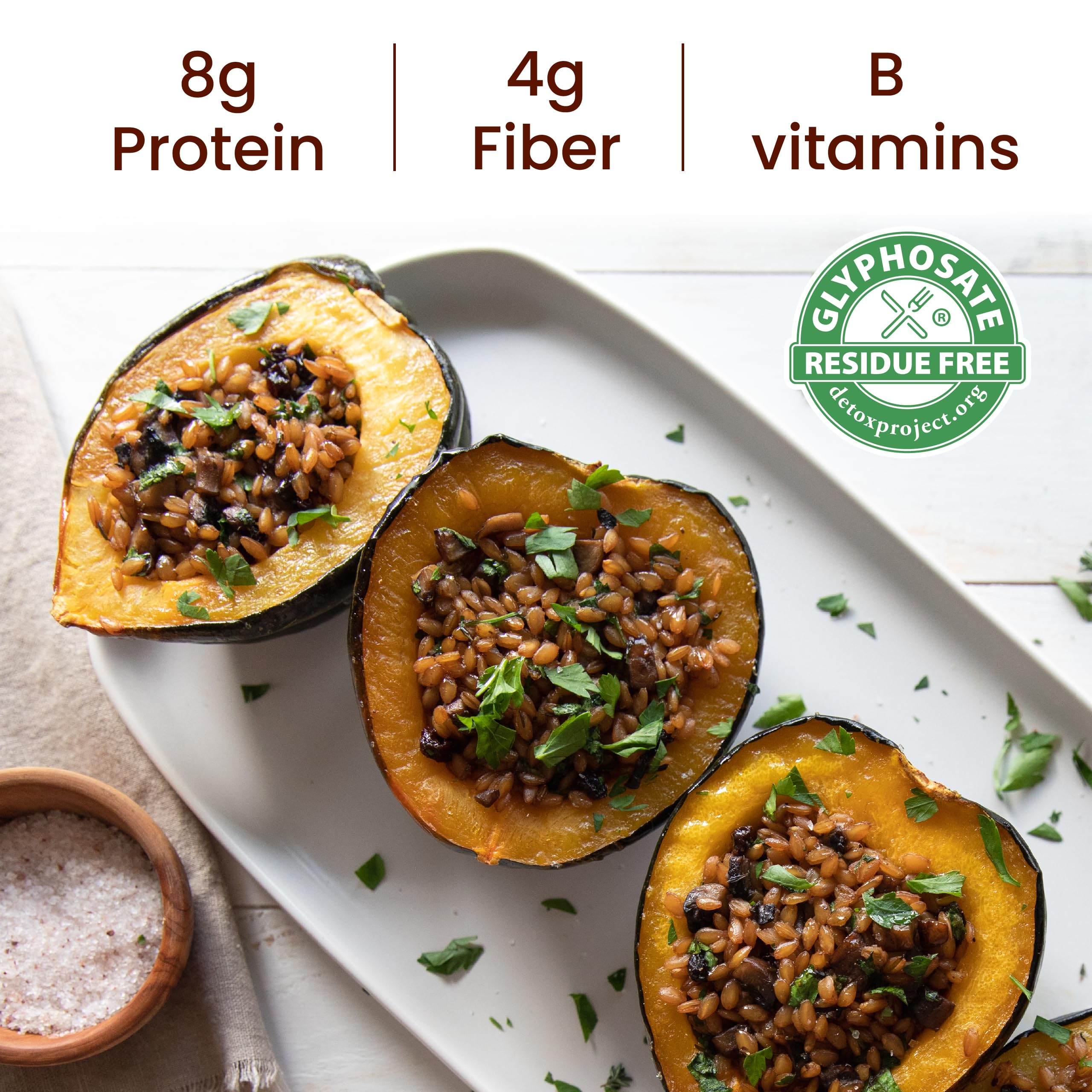 Jovial cooked einkorn grain bowl with vegetables illustrating hearty meal versatility