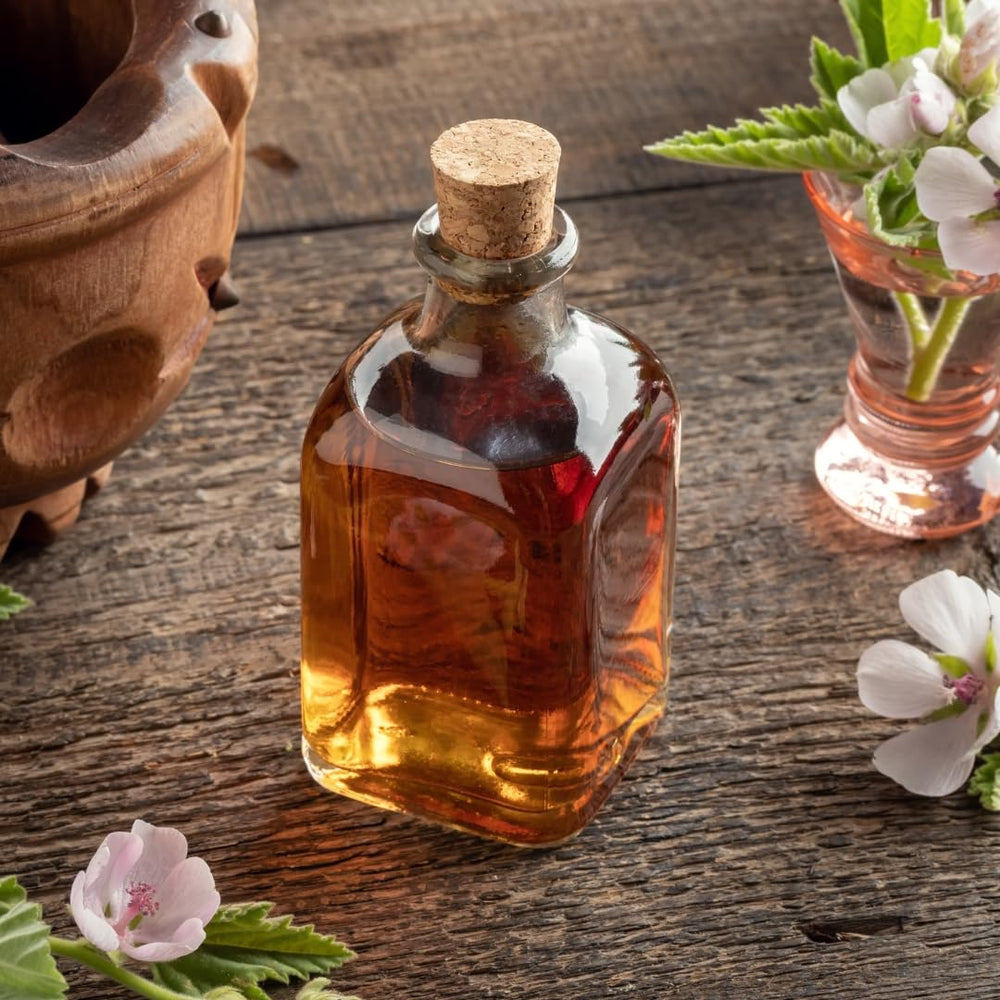 Jovvily brewed marshmallow root tea in cup showing warm inviting color