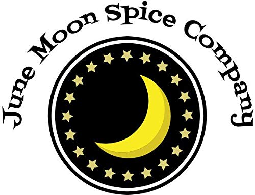 June Moon Spice Company jar on grill-side table with utensils, ideal for backyard cookouts