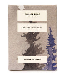Juniper Ridge teabag contents close-up showing fir tips and natural botanicals