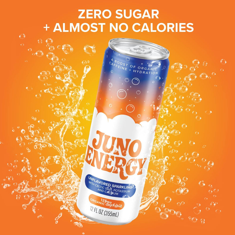 JUNO ENERGY poured into a glass with ice, demonstrating clarity and fizzy hydration