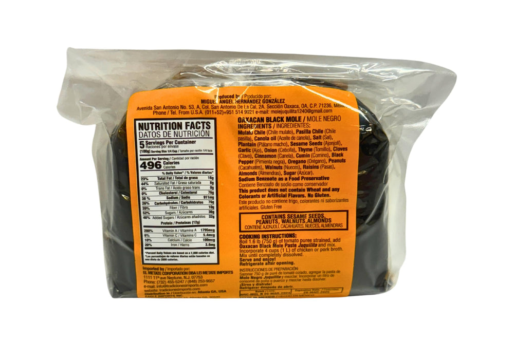 Juquilita mole negro paste spoon showing rich texture and flavor boost