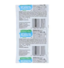 JUST-BUY ranch packet being squeezed onto fries showing creamy texture and flavor boost