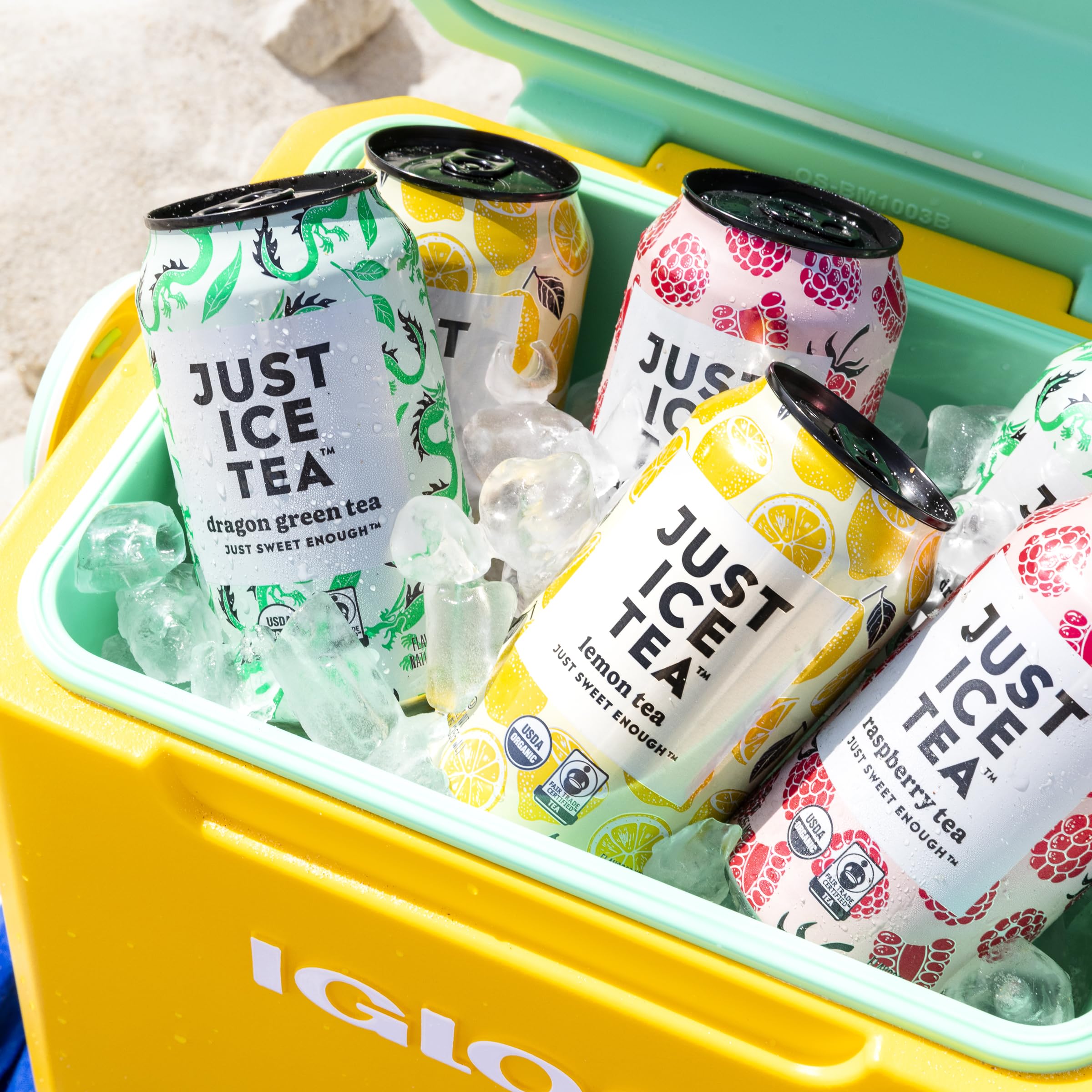 Just Ice Tea organic black tea leaves and lemon slices, emphasizing real-brewed ingredients