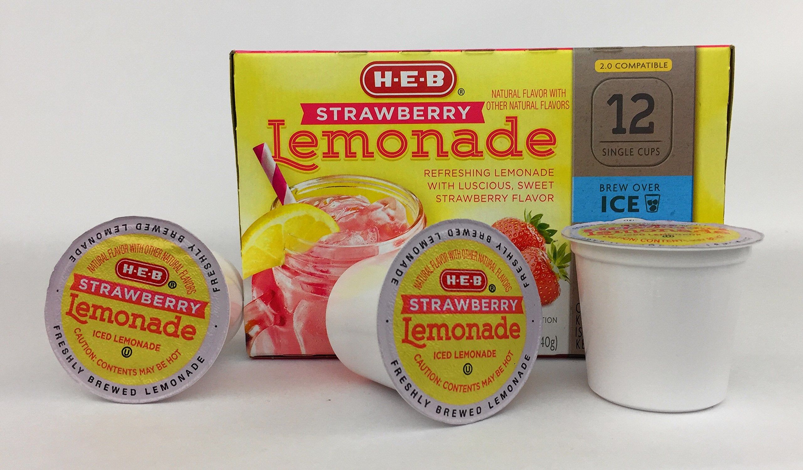 K-Cup HEB beside fresh strawberries and lemon, showing true-to-fruit flavor