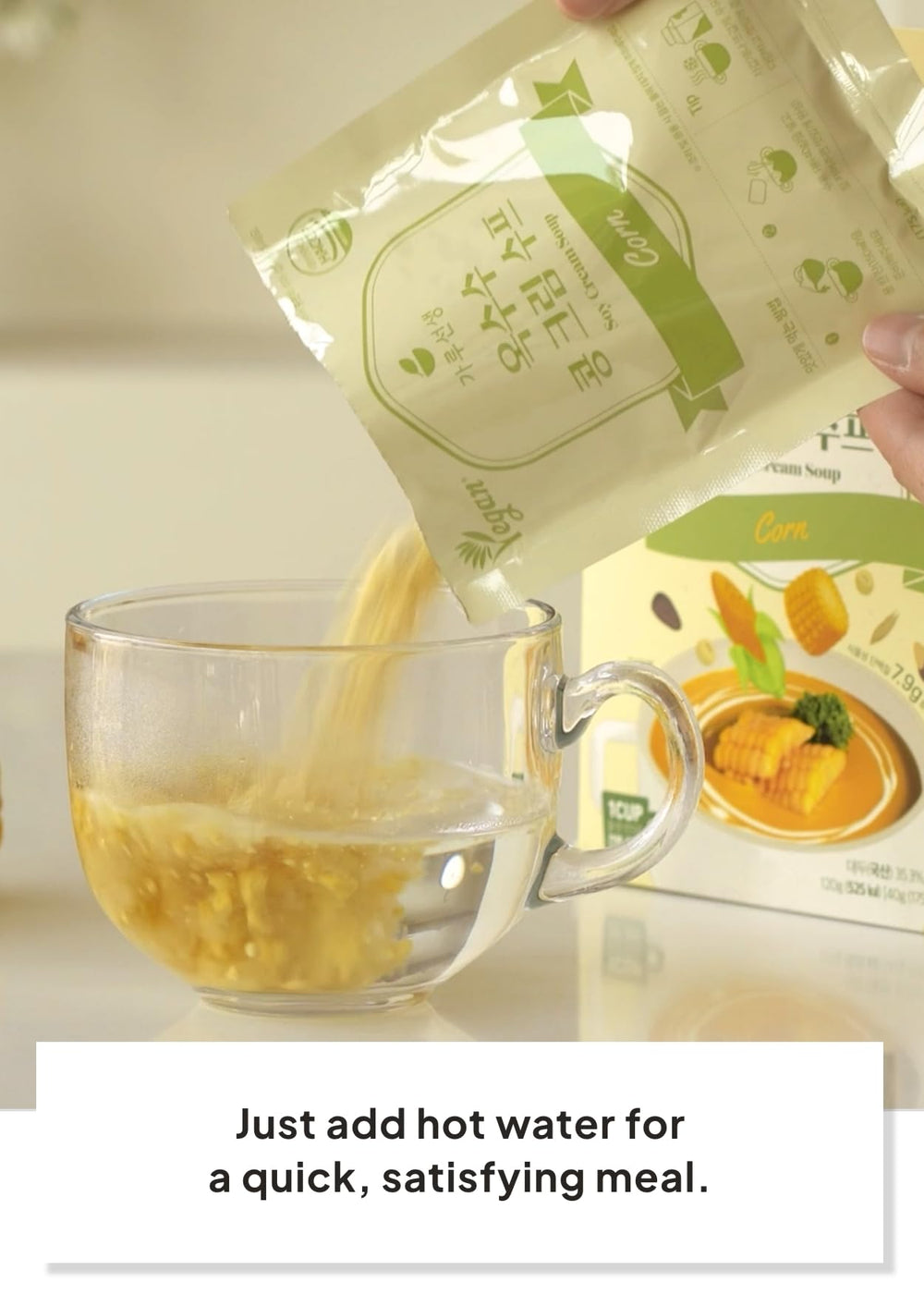 K FOOD KOREAN FOOD cup beside a credit card for scale, compact travel-friendly size