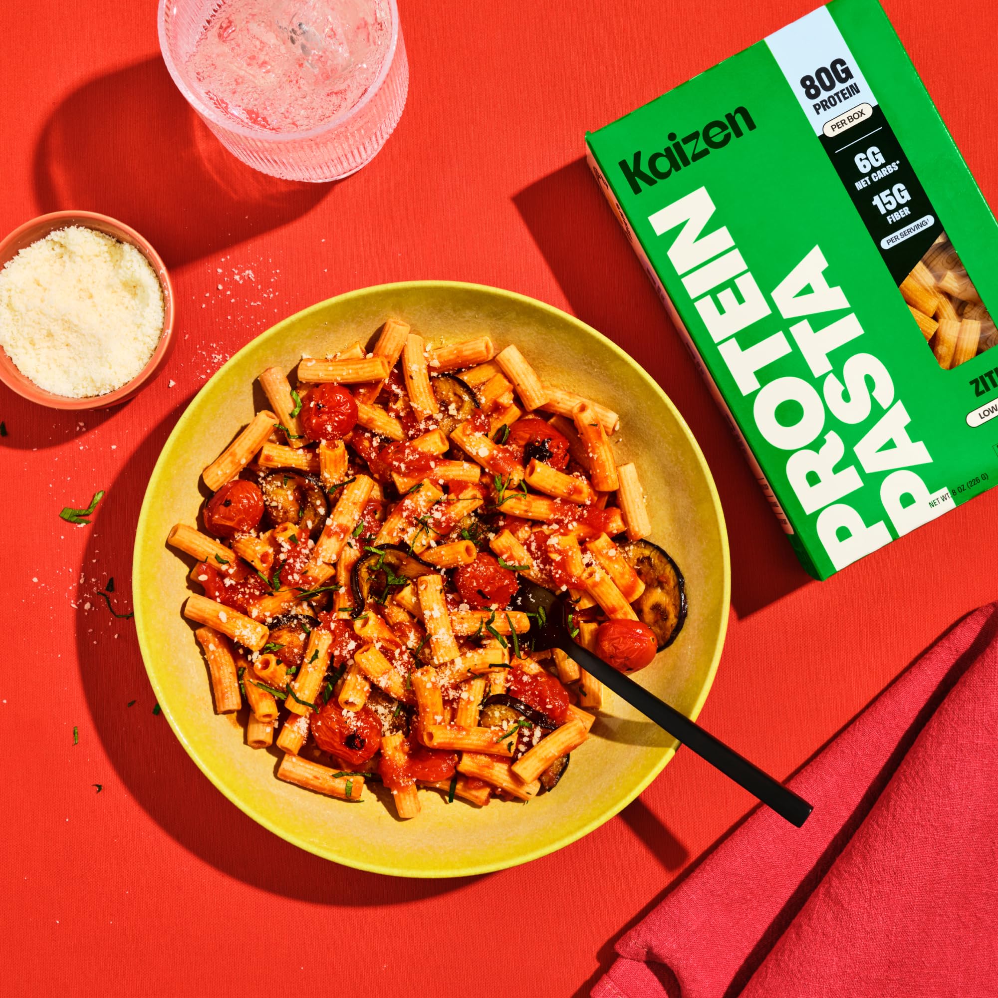 Kaizen Food Company ziti next to a measuring cup for clear serving size