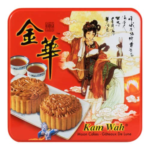 Kam Wah sliced mooncake on plate revealing smooth lotus paste filling benefit