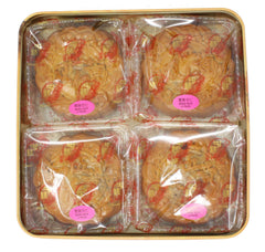 Kam Wah mooncake single slice with two yolks visible highlighting shareable portions