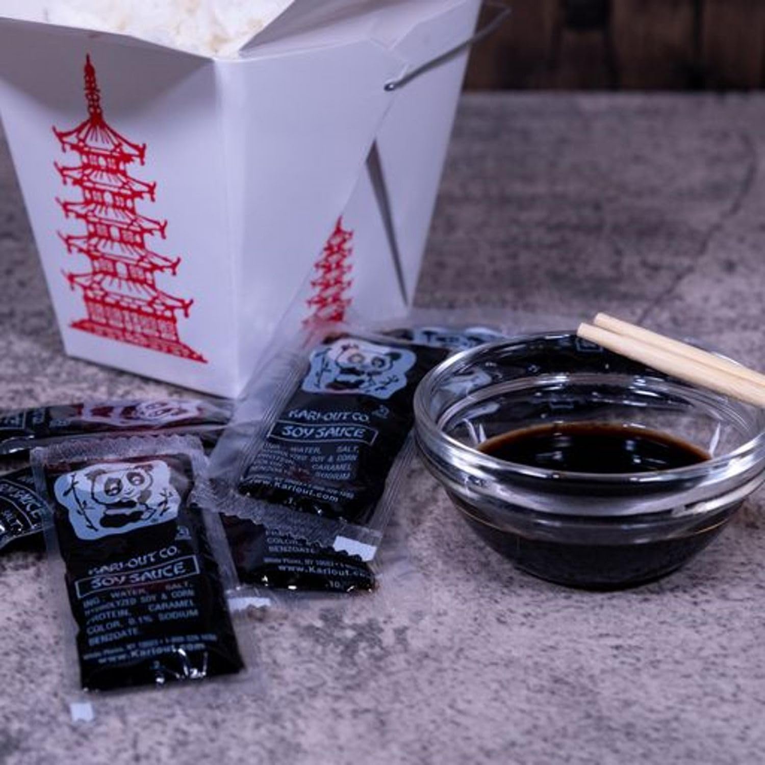 Close-up of Kari-Out soy sauce packet seal and texture highlighting hygienic single-serve