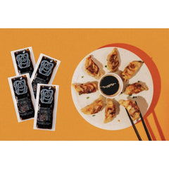 Kari-Out soy sauce packet being poured on sushi demonstrating spill-free convenience