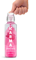 Karma bottle closeup label showing probiotic and vitamin benefits