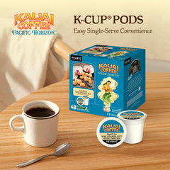Kauai Coffee pod placed in Keurig brewer demonstrating easy single-serve brewing