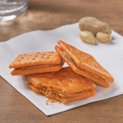 Keebler pouch beside a smartphone showing compact 1.8 oz travel-friendly size