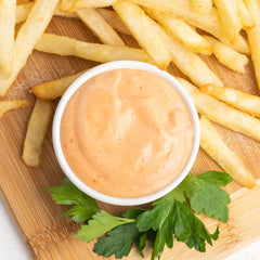 Ken's Boom Boom Sauce pour closeup highlighting creamy texture and consistency