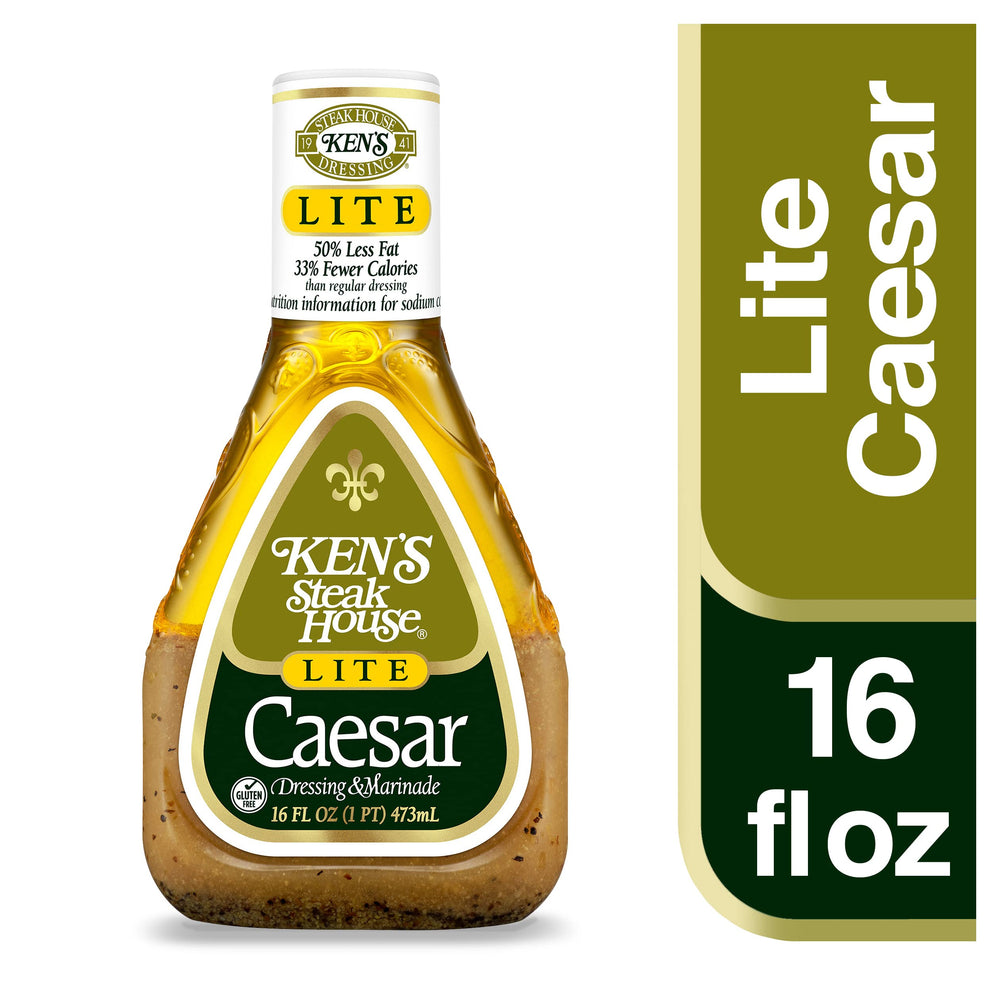 Ken's light Caesar pouring from bottle onto salad to add creamy Caesar flavor quickly