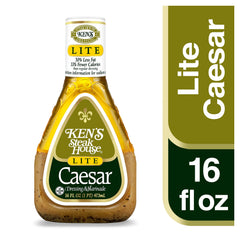 Ken's light Caesar pouring from bottle onto salad to add creamy Caesar flavor quickly