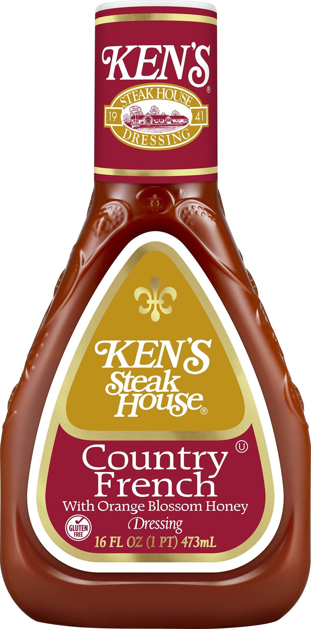 Ken's Steak House pouring dressing on mixed salad for added flavor