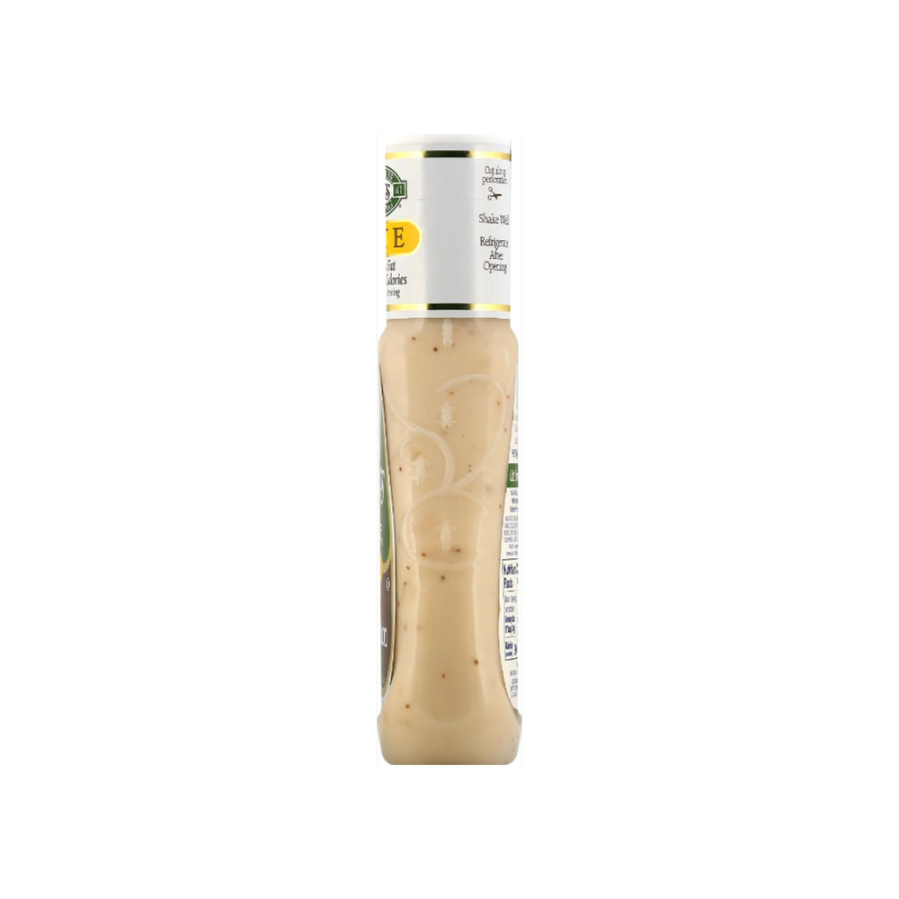 Ken's Steak House spoon showing creamy dressing texture, offers easy blending benefit
