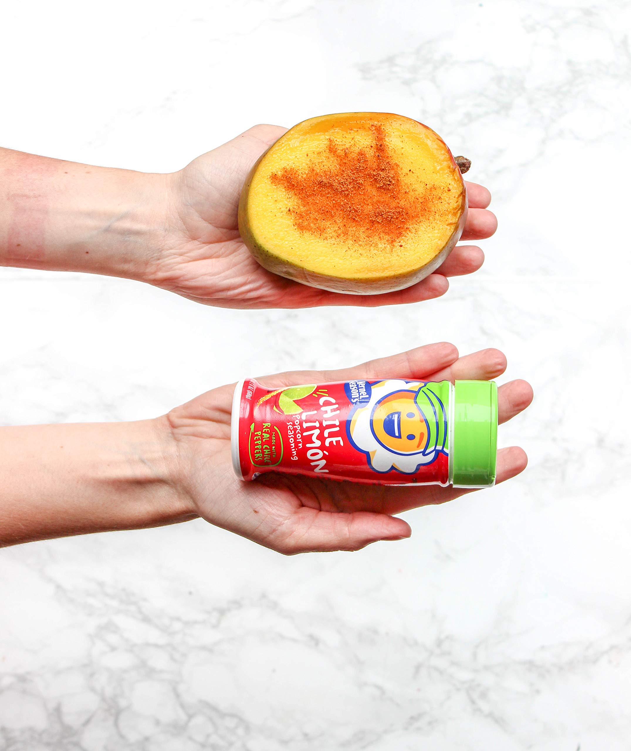 Kernel Season's poured on popcorn illustrating instant flavor boost for snacks