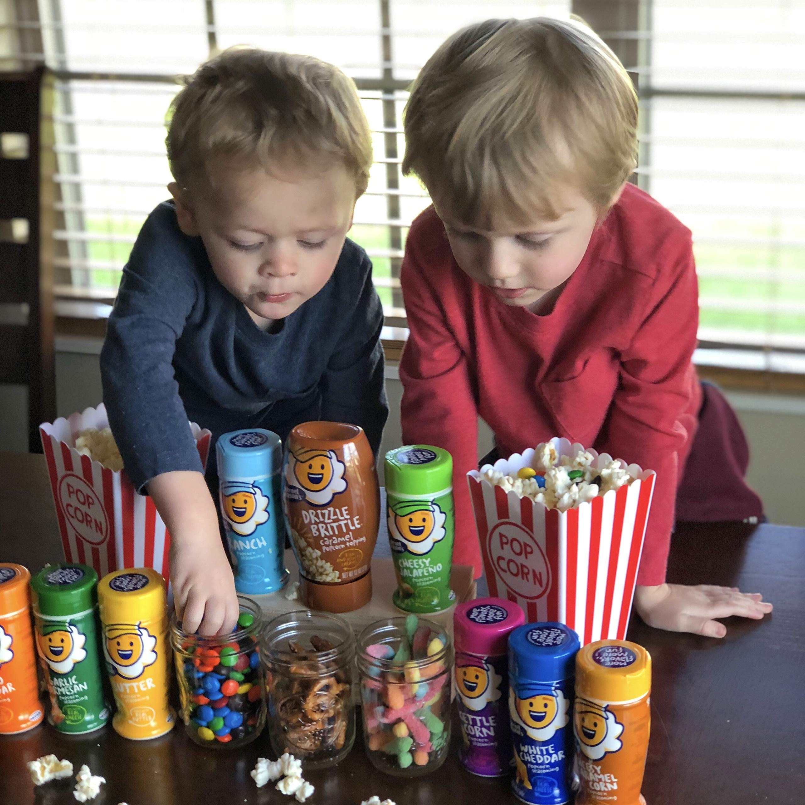 Kernel Season's seasoning used at snack spread conveying crowd-pleasing flavor