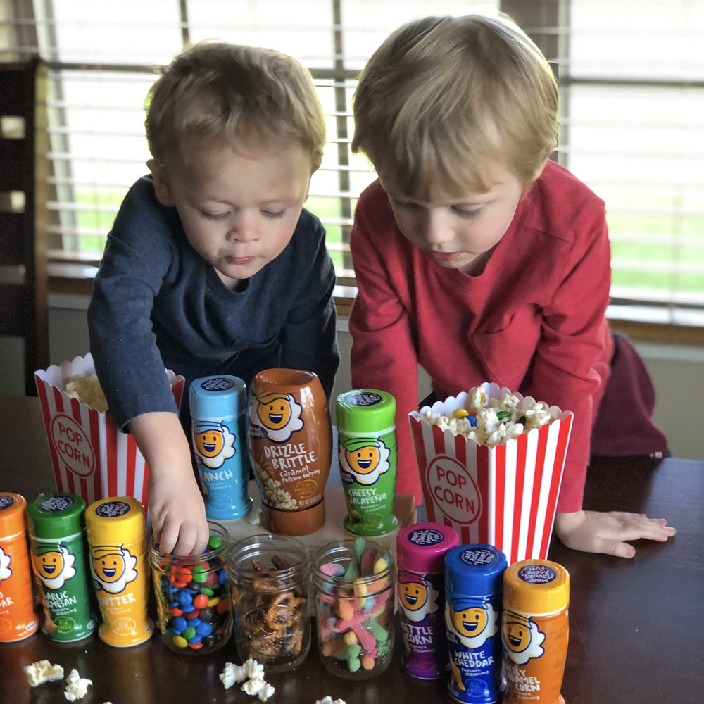 Kernel Season's seasoning used at snack spread conveying crowd-pleasing flavor