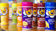 Kernel Season's seasoning sprinkled on popcorn bowl delivering bold flavor