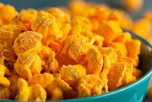 Kernel Season's powder texture macro shot showing fine cheese granules